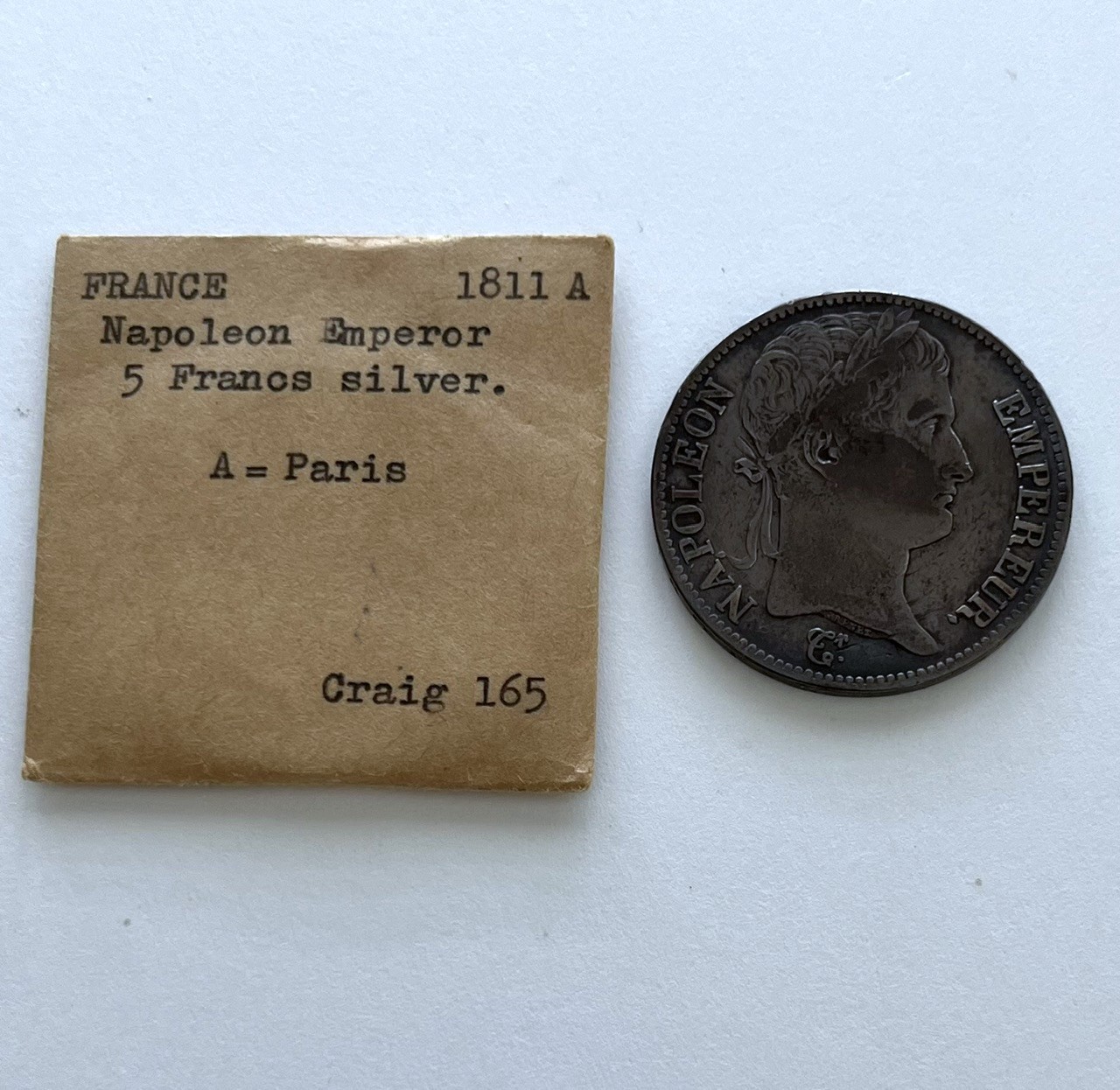 1811-A French 5 Francs Silver Coin featuring Emperor Napoleon I