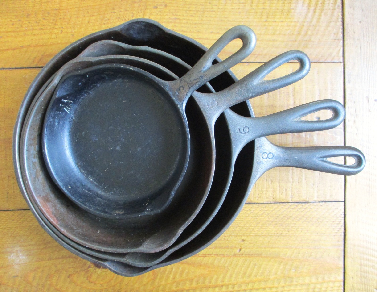 FOUR vintage WAGNER WARE Sidney -O- Cast Iron Skillet Set #3, #5, #6, #8