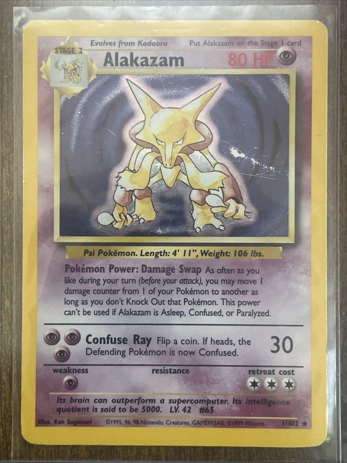 Alakazam 001/102 Base Set Holo Pokemon Card Alakazam 001/102 Base Set Holo Pokemon Card