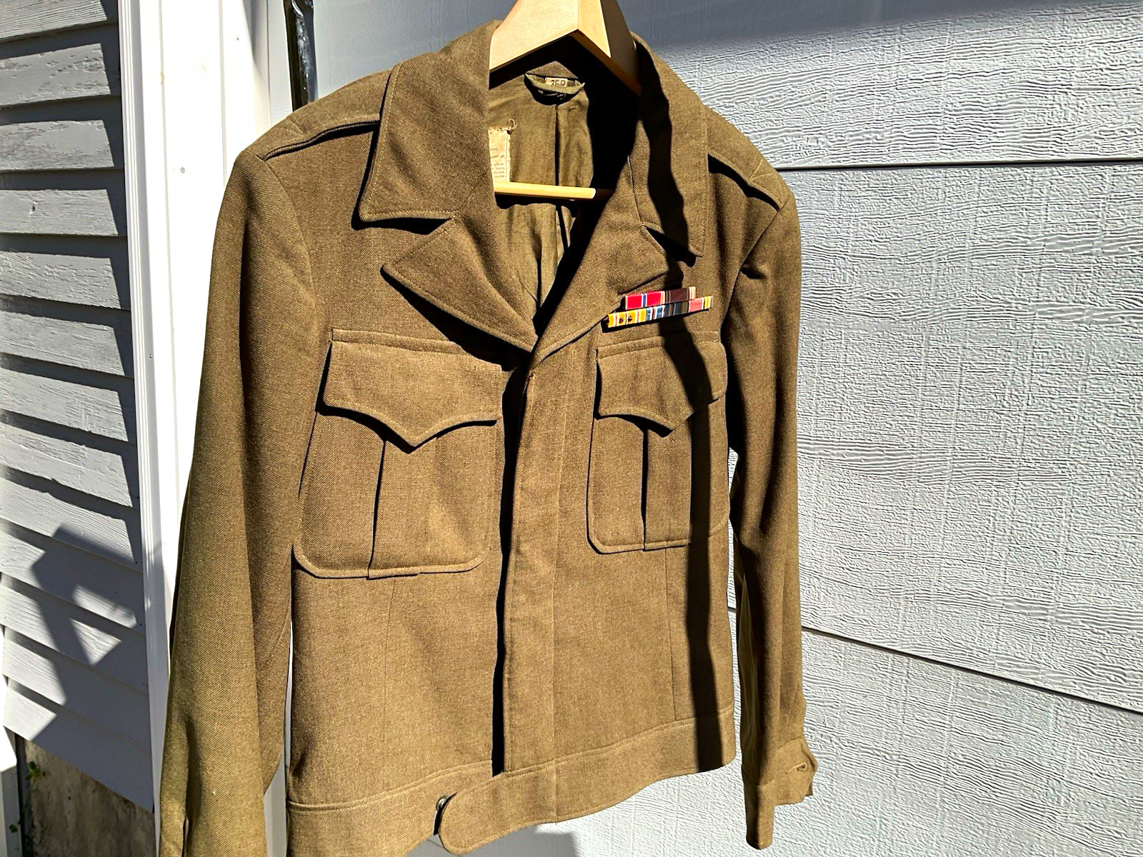 WWII US Army OD Wool Field Jacket with Ribbon Bars - Original US Militaria WWII US Army OD Wool Field Jacket with Ribbon Bars - Original US Militaria