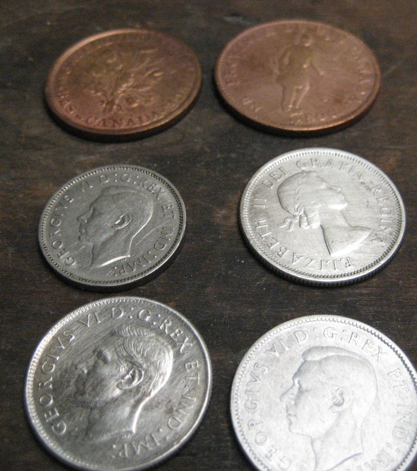 Canadian 2 large cents 4 quarters with various dates Canadian 2 large cents 4 quarters with various dates