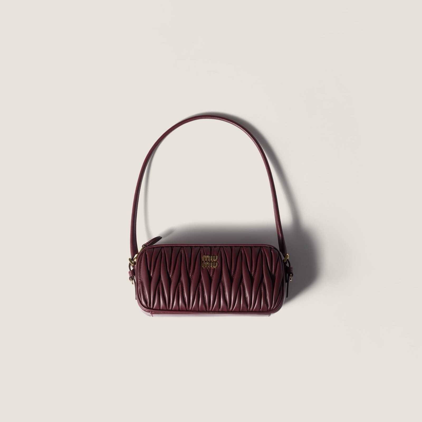 Miu Miu Matelassé Nappa Leather Pouch Bag Burgundy BNWT  Description  Brand new