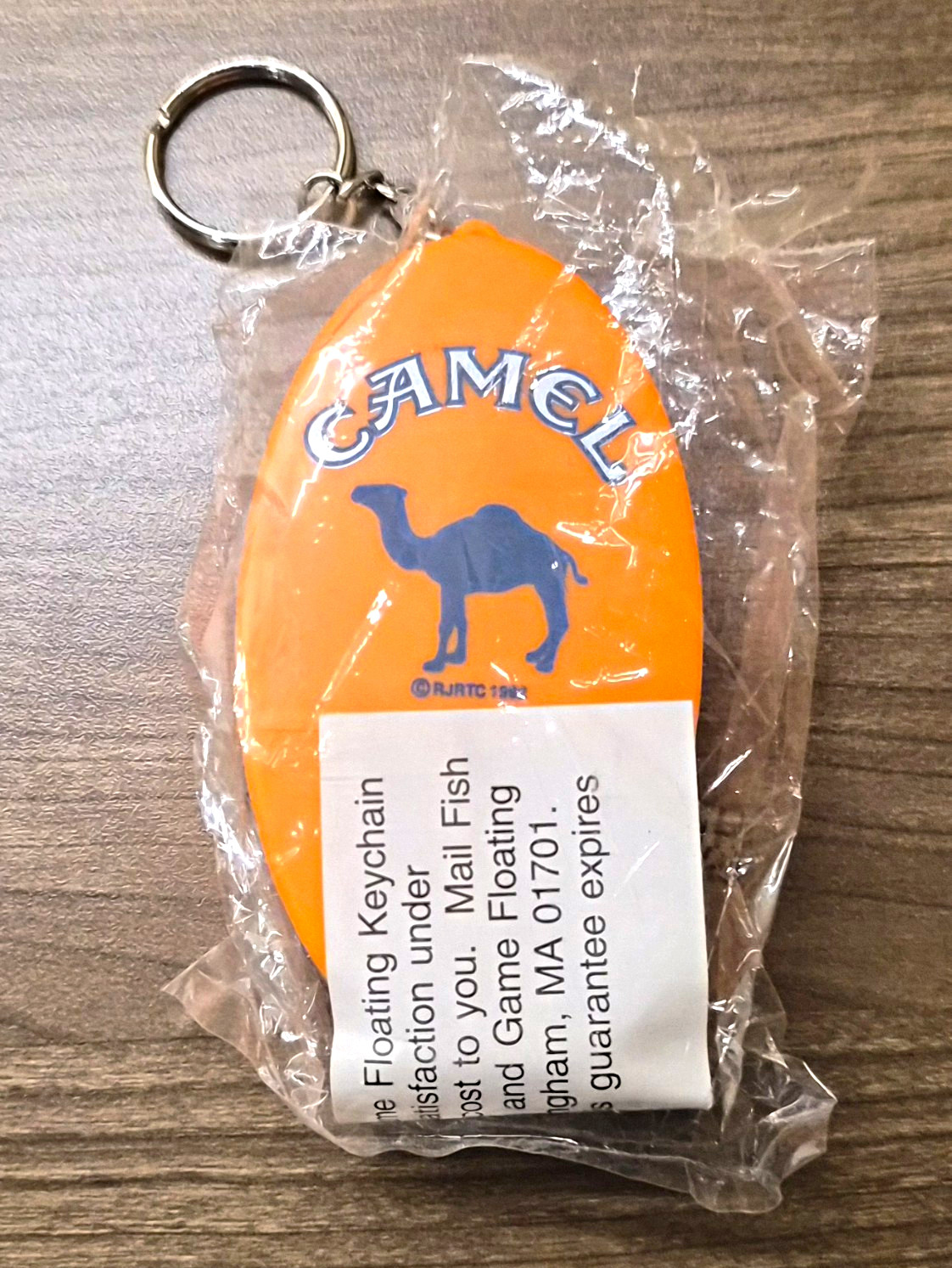 1994 Camel Cigarettes Floating Keychain Lighter Holder NOS Sealed Orange RJRTC