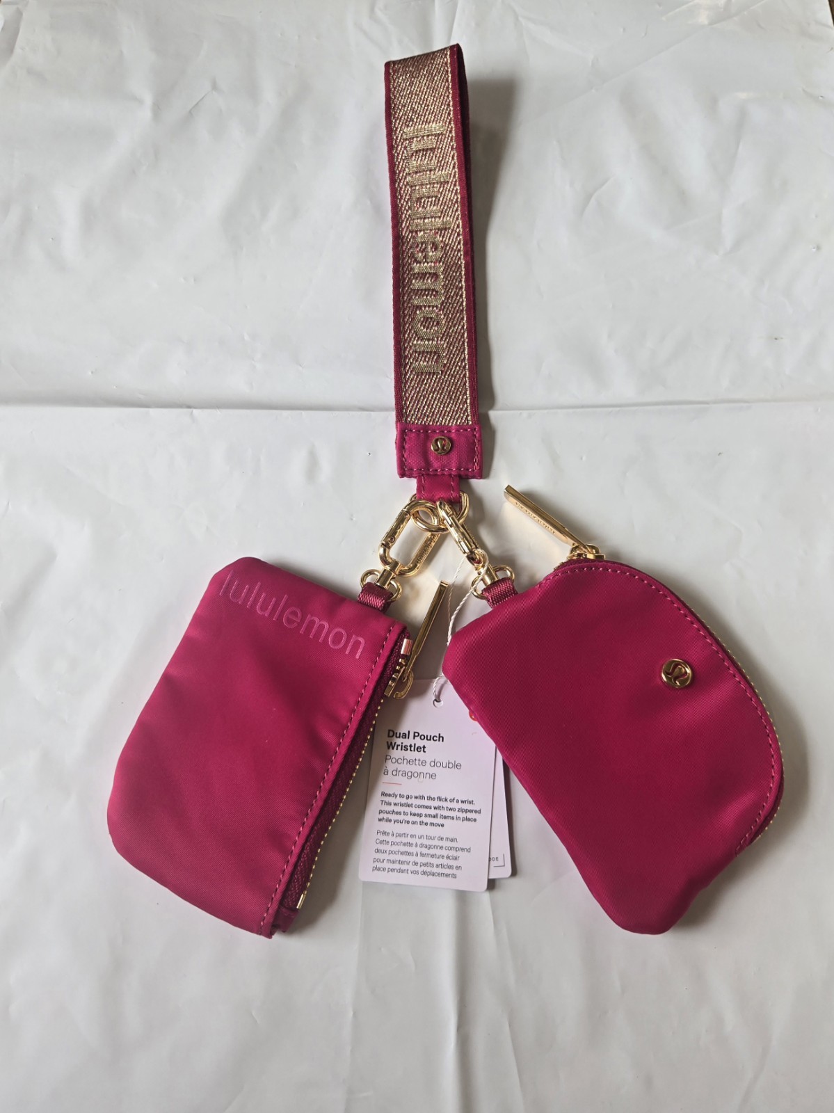 Lululemon Dual Pouch Wristlet Berry Rumble pink 💖 Gold NWT Lululemon Dual Pouch Wristlet Berry Rumble pink 💖 Gold NWT