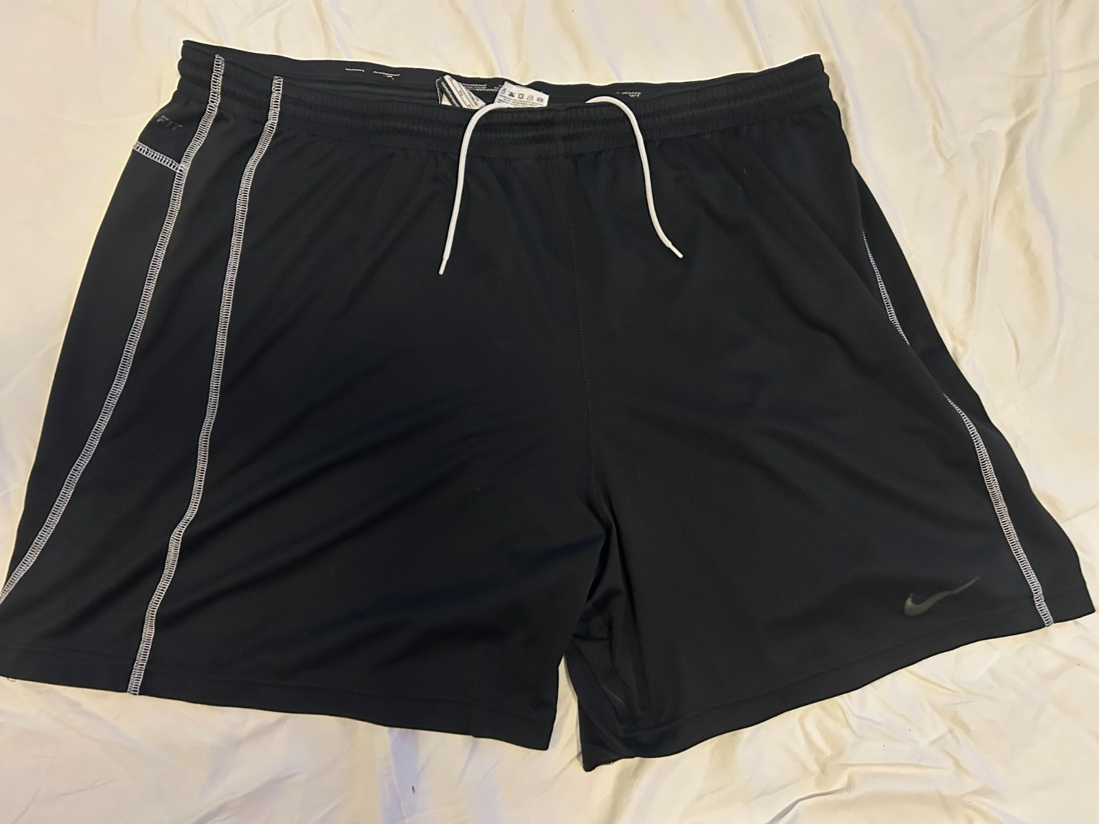 Men’s Nike Shorts Size XL Dri-Fit black with white stitching and drawstrings