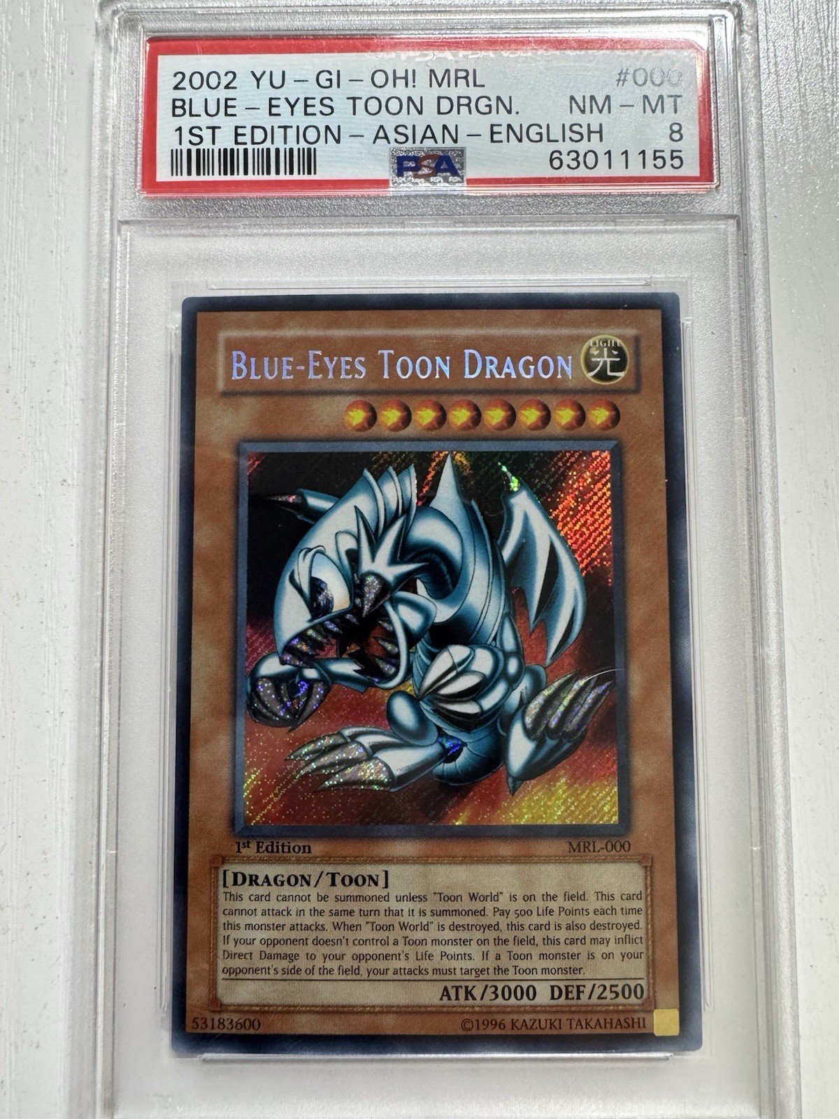 Yu-Gi-Oh Blue-Eyes Toon Dragon MRL-000 1st Ed Secret Rare PSA 8 Asian English