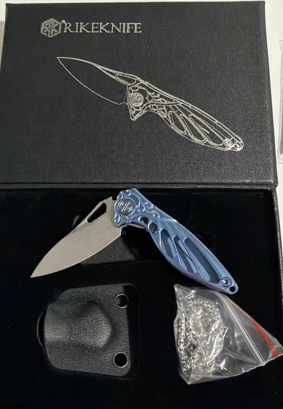 Rike Mini Hummingbird Folding Knife Blue Titanium Handle Rose Damascus new Rike Mini Hummingbird Folding Knife Blue Titanium Handle Rose Damascus new
