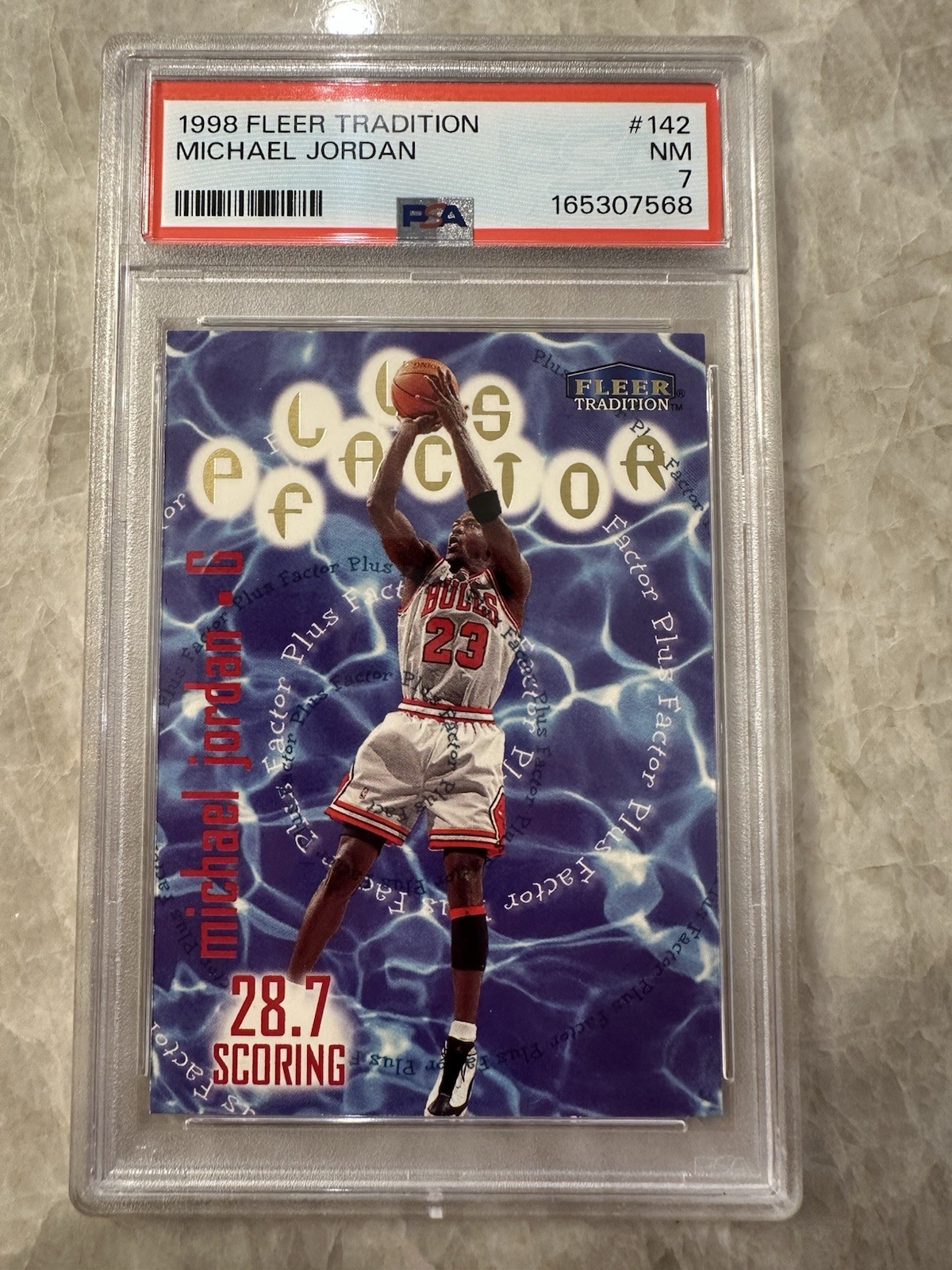 1998-99 Fleer Tradition - Plus Factor Michael Jordan #142 PSA 7 NM Card Bulls 1998-99 Fleer Tradition - Plus Factor Michael Jordan #142 PSA 7 NM Card Bulls