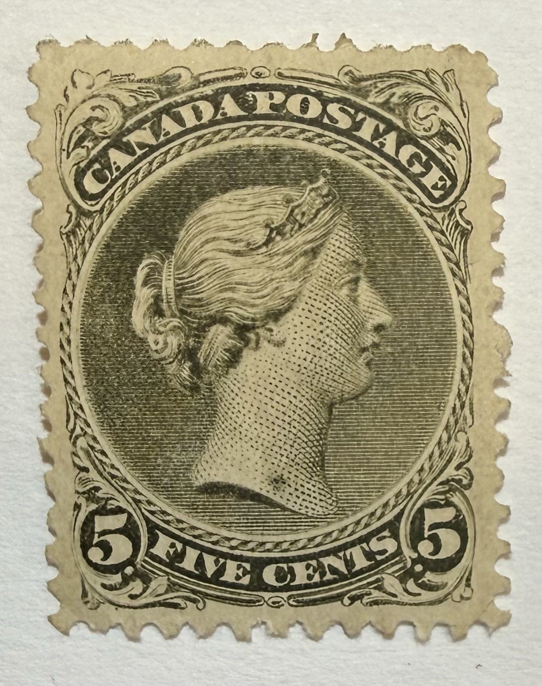 Canada #26 1868 5c olive green “Large Queen” perf 12 MNG/VF, spot; $2.5K UCV Canada #26 1868 5c olive green “Large Queen” perf 12 MNG/VF, spot; $2.5K UCV