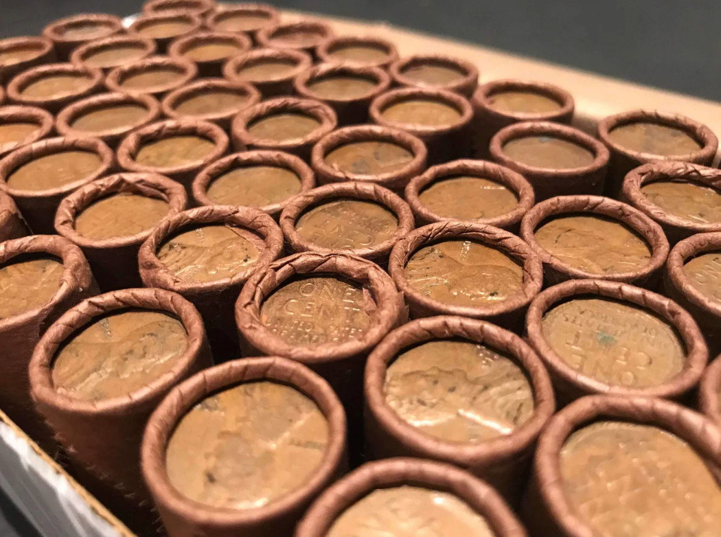 TIGHTLY CRIMPED ROLLS OF OLD WRAPPED WHEAT PENNIES