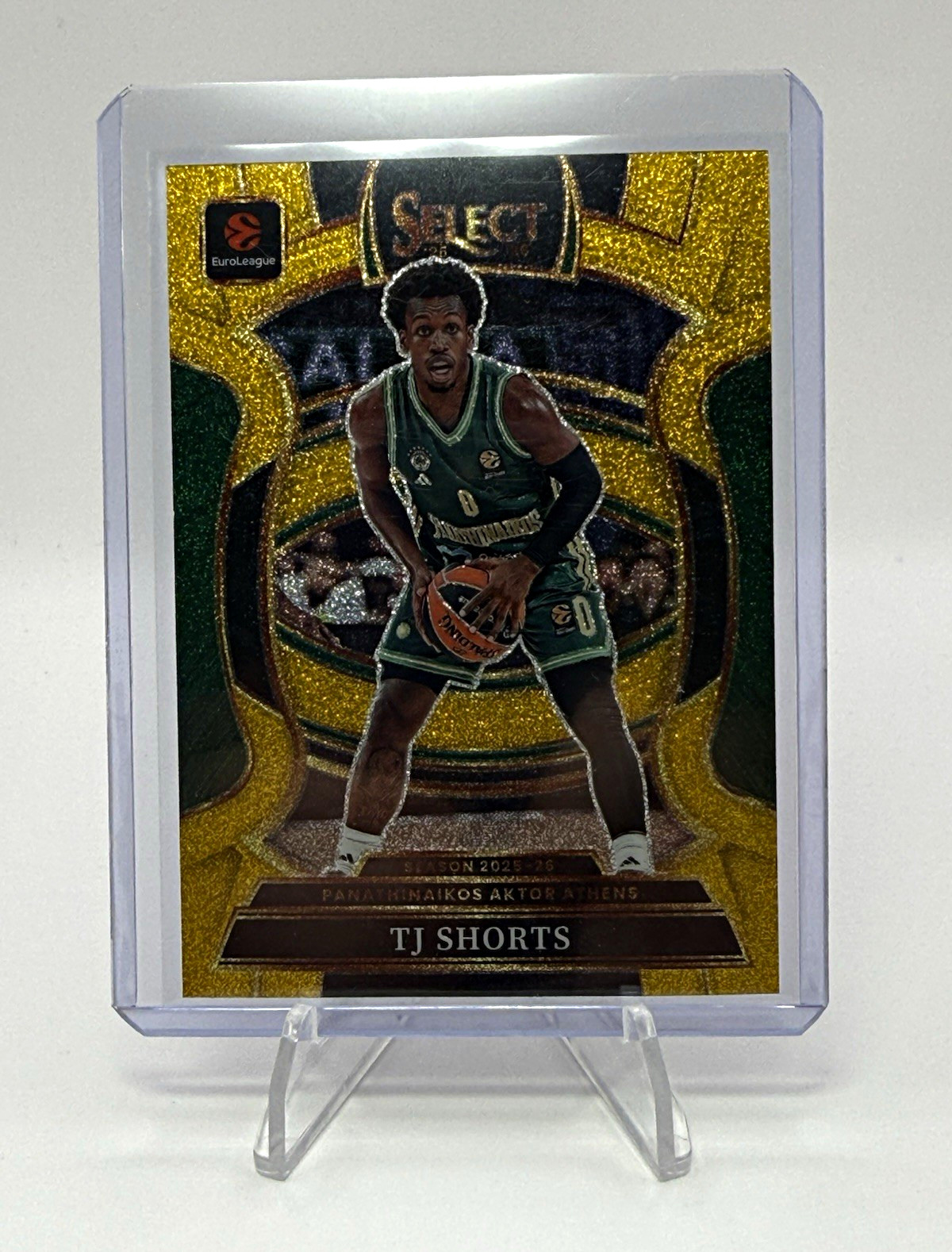 2025-26 Panini Select EuroLeague BK TJ Shorts Concourse Lvl. Gold Glitter 2025-26 Panini Select EuroLeague BK TJ Shorts Concourse Lvl. Gold Glitter