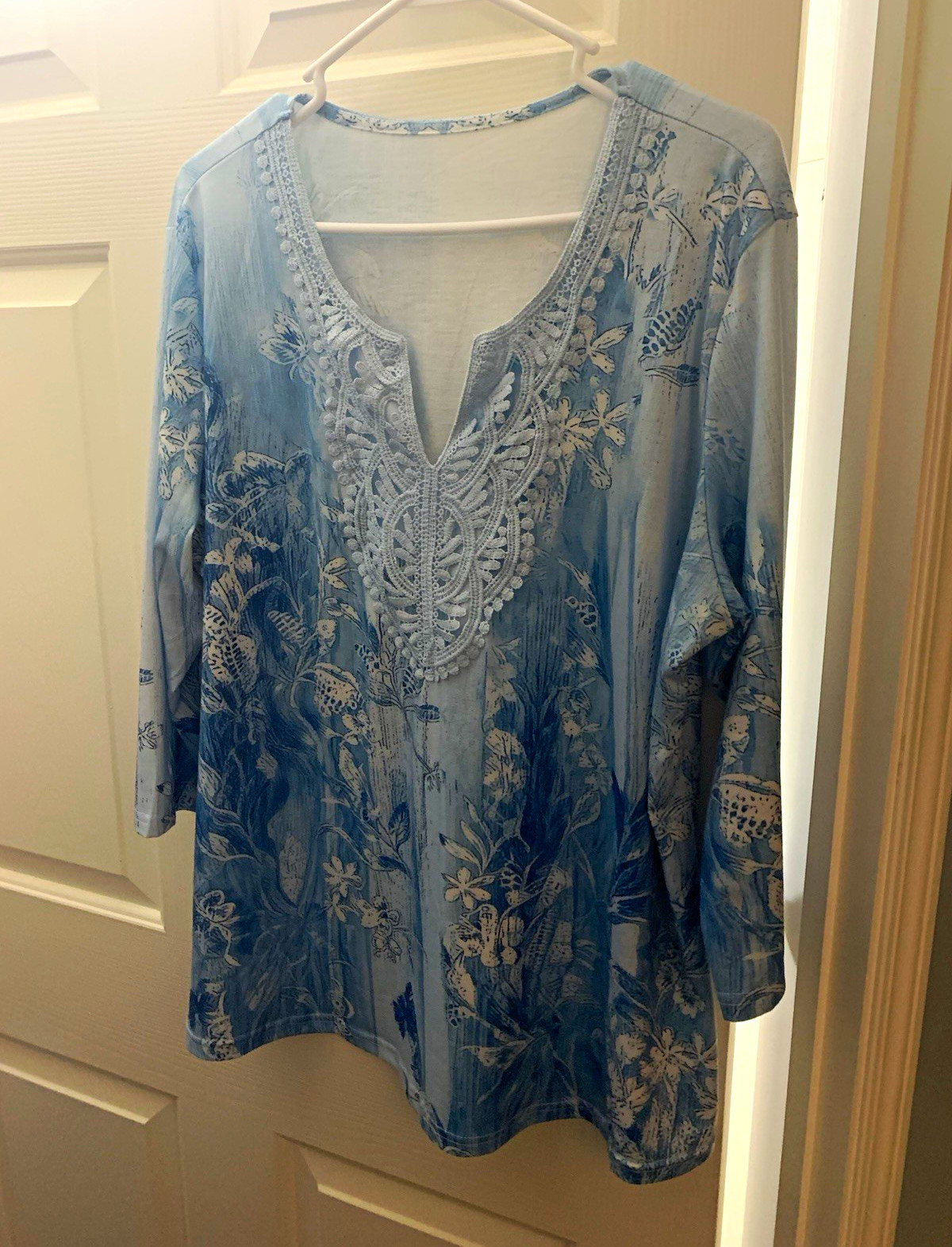 Women’s Blue Floral Embroidered V-Neck 3/4 Sleeve Pullover Knit Tunic Top Women’s Blue Floral Embroidered V-Neck 3/4 Sleeve Pullover Knit Tunic Top