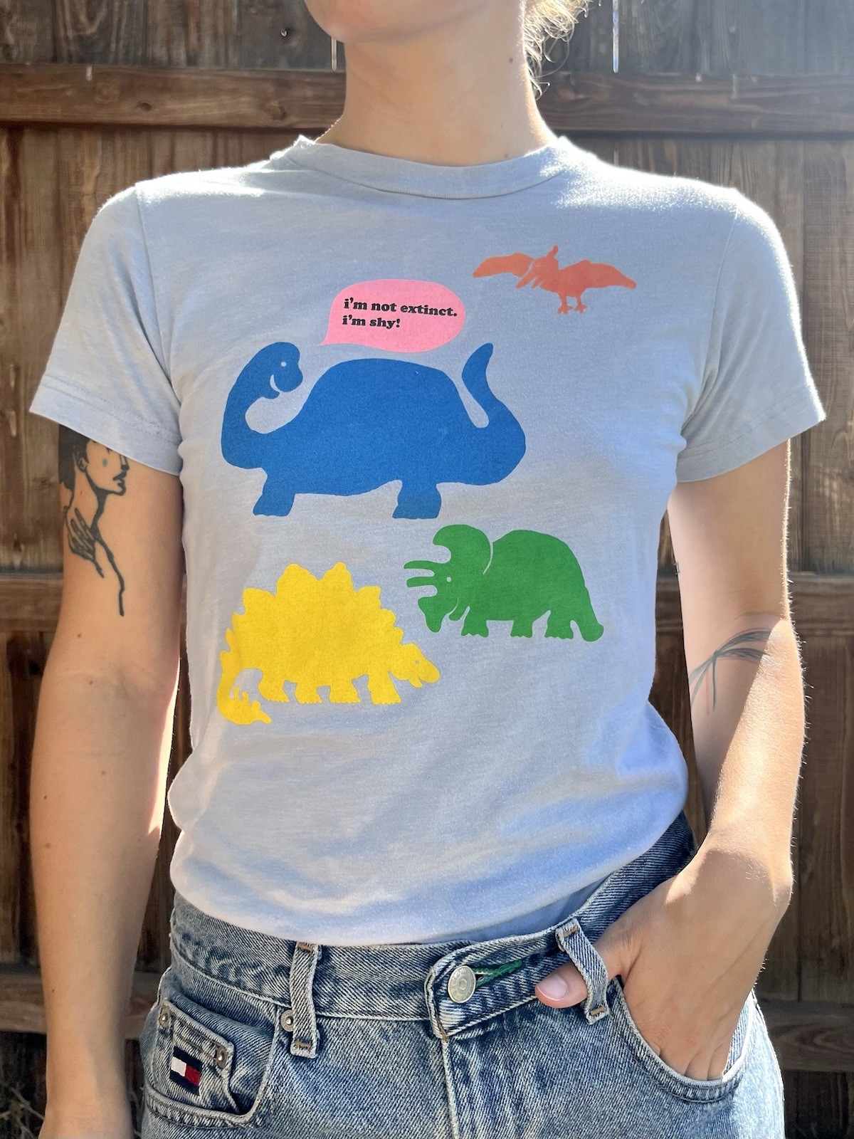 Vintage Y2K “I’m Not Extinct. I’m Shy” Retro Dinosaur Baby Tee