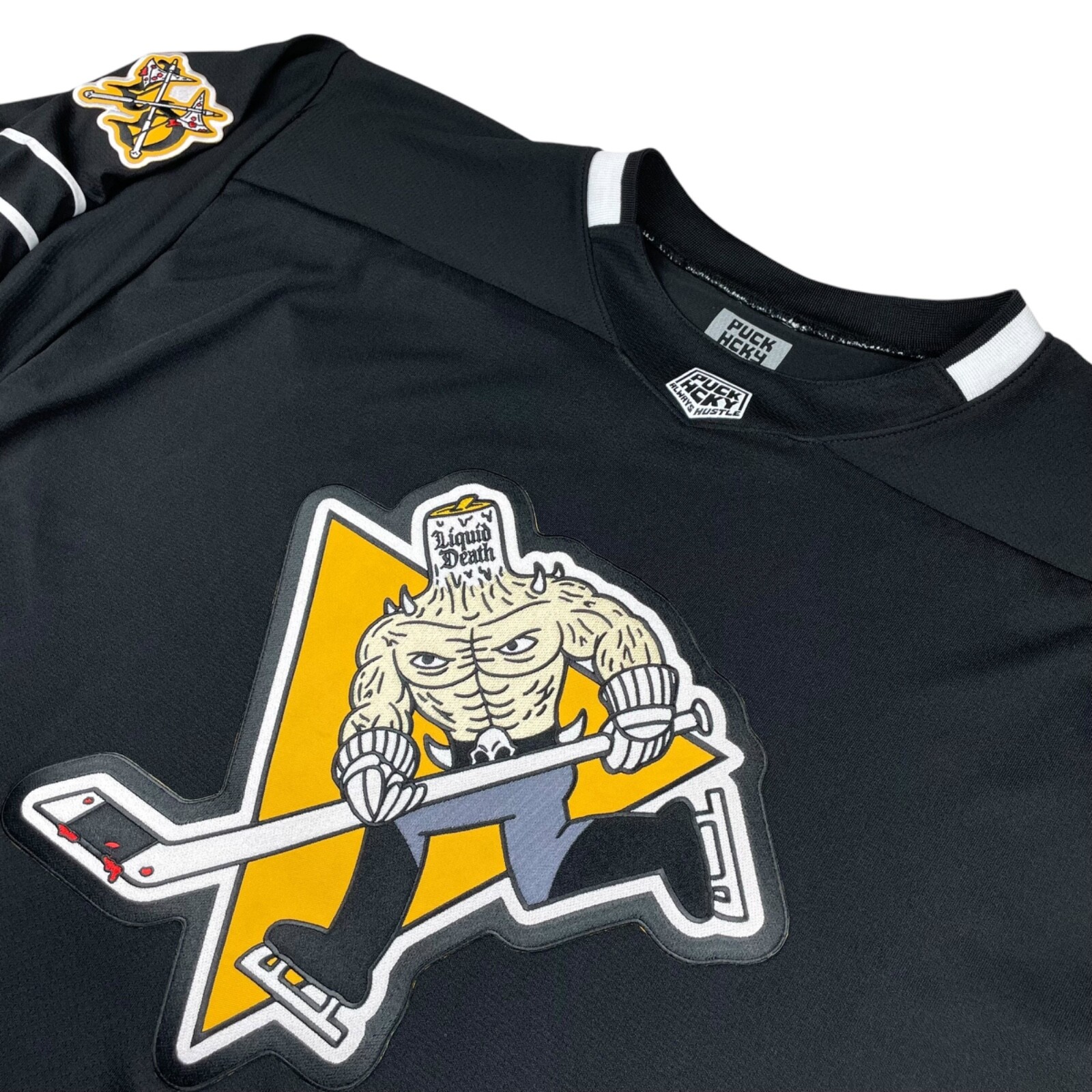 NEW Puck Hcky x Liquid Death #66 Men\'s Hockey Jersey Black/White • Large NEW Puck Hcky x Liquid Death #66 Men\'s Hockey Jersey Black/White • Large