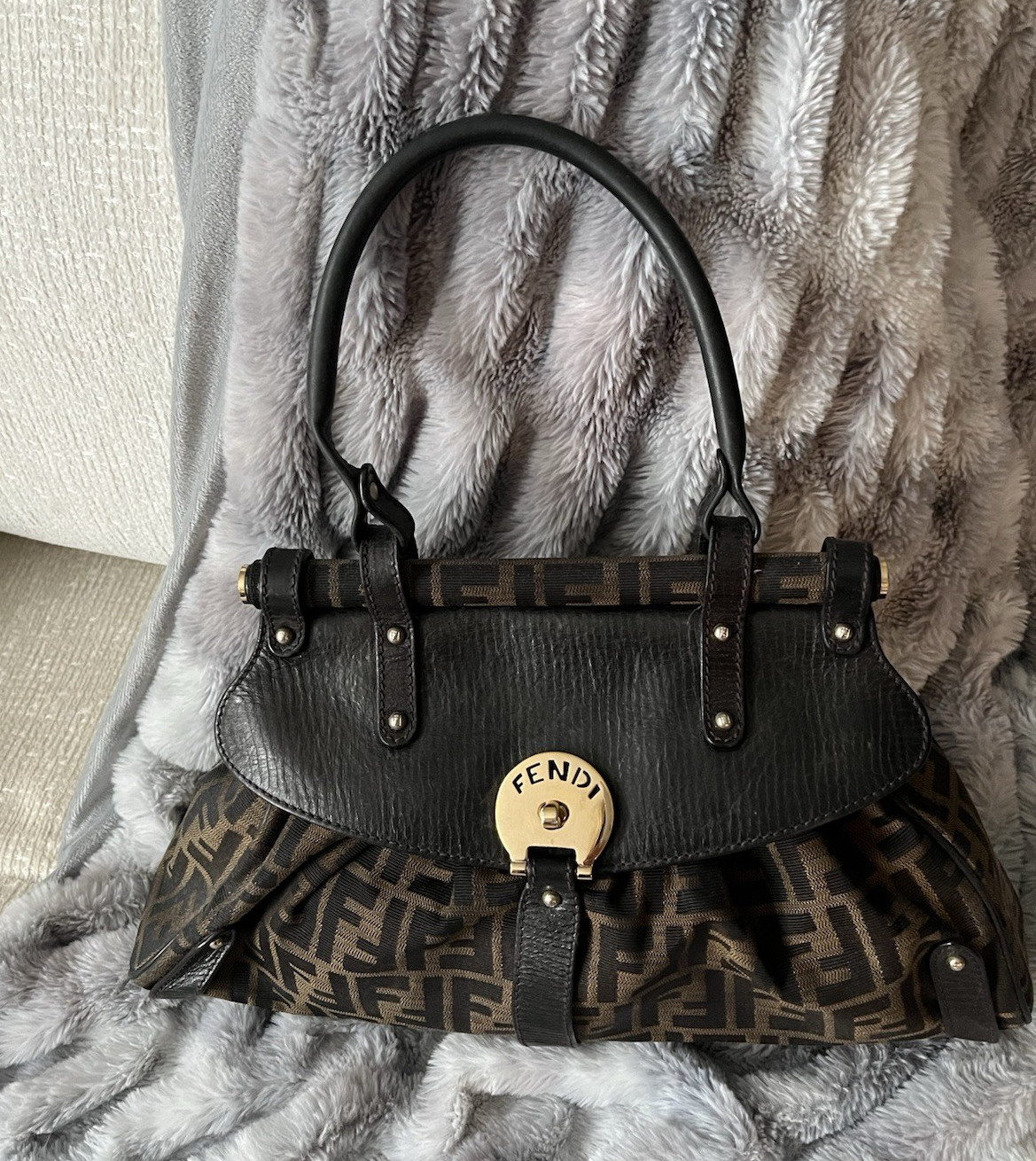 Fendi Brown Monogram Jacquard Canvas Leather Sachel Handbag with gold clasp.