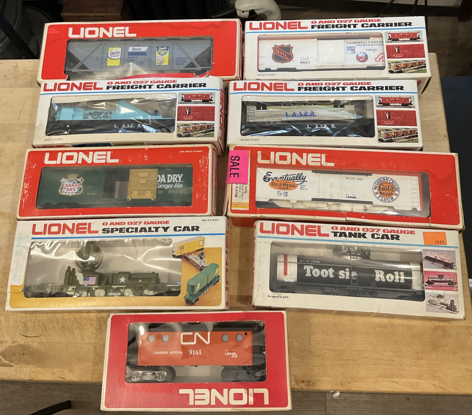 1970s LIONEL 0/027 Lot (9) Rolling Stock NHL LASER Marines Caboose W Boxes