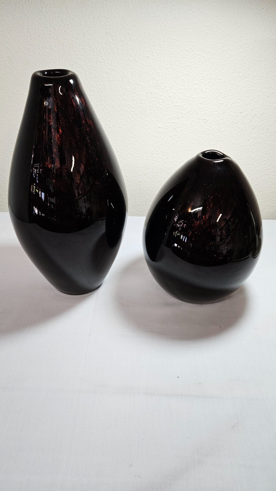 Vintage Tony Evans hand blown art vase pair in black marble and metallic copper