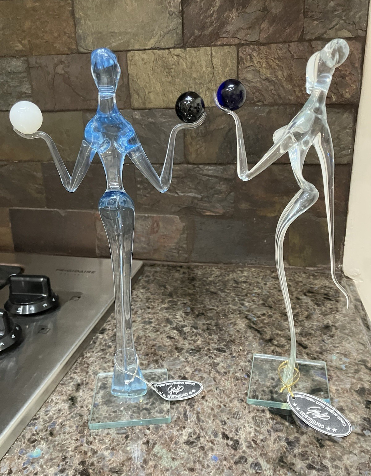 Pair of Vintage Czech Handmade Art Glass Female Figurines Holding Balls – 11½” Pair of Vintage Czech Handmade Art Glass Female Figurines Holding Balls – 11½”