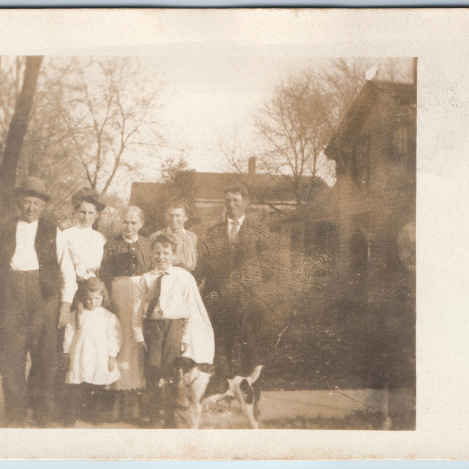 c1910s Outdoor Family Group Photo RPPC Postcard Men Women Children Dog House DB