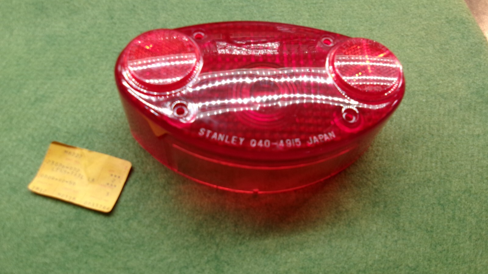 KAWASAKI H1 H2 S3 MORE TAILLIGHT LENS NOS OEM 23026-022 KAWASAKI H1 H2 S3 MORE TAILLIGHT LENS NOS OEM 23026-022