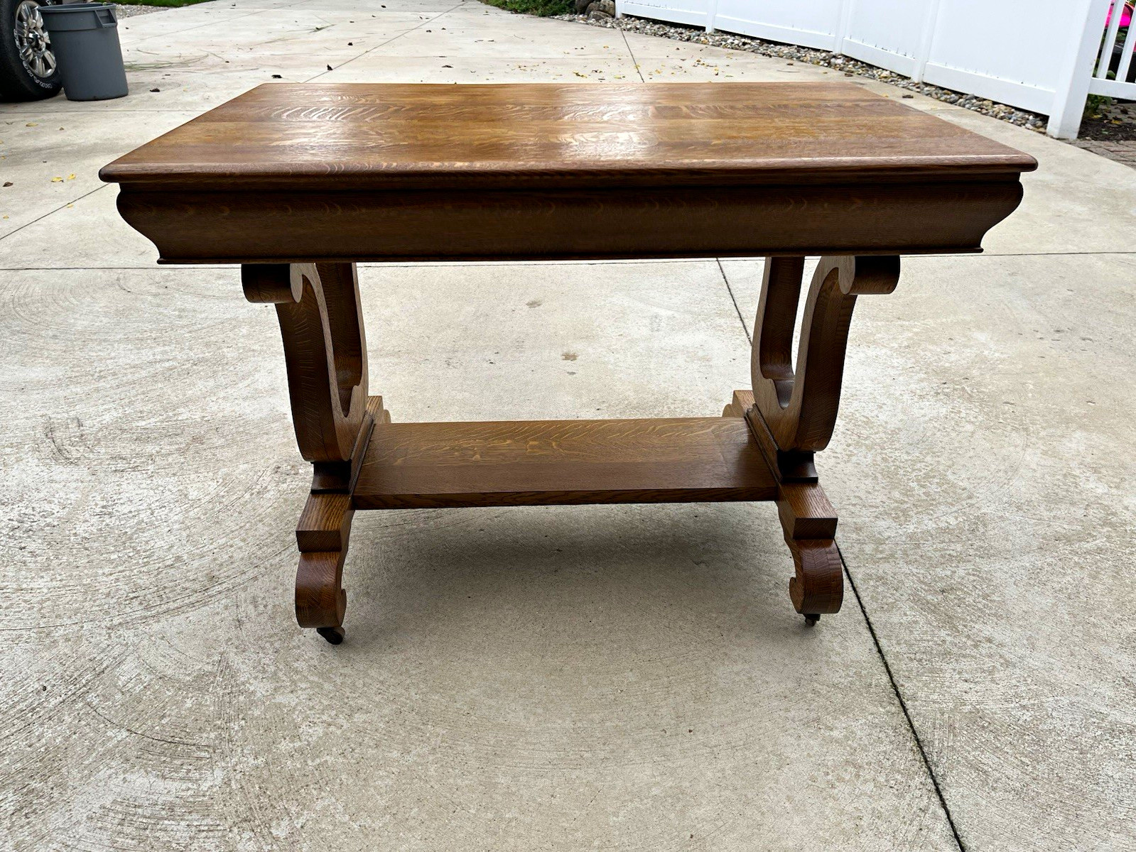 Beautifully refinished antique quarter sawn oak library table with drawer