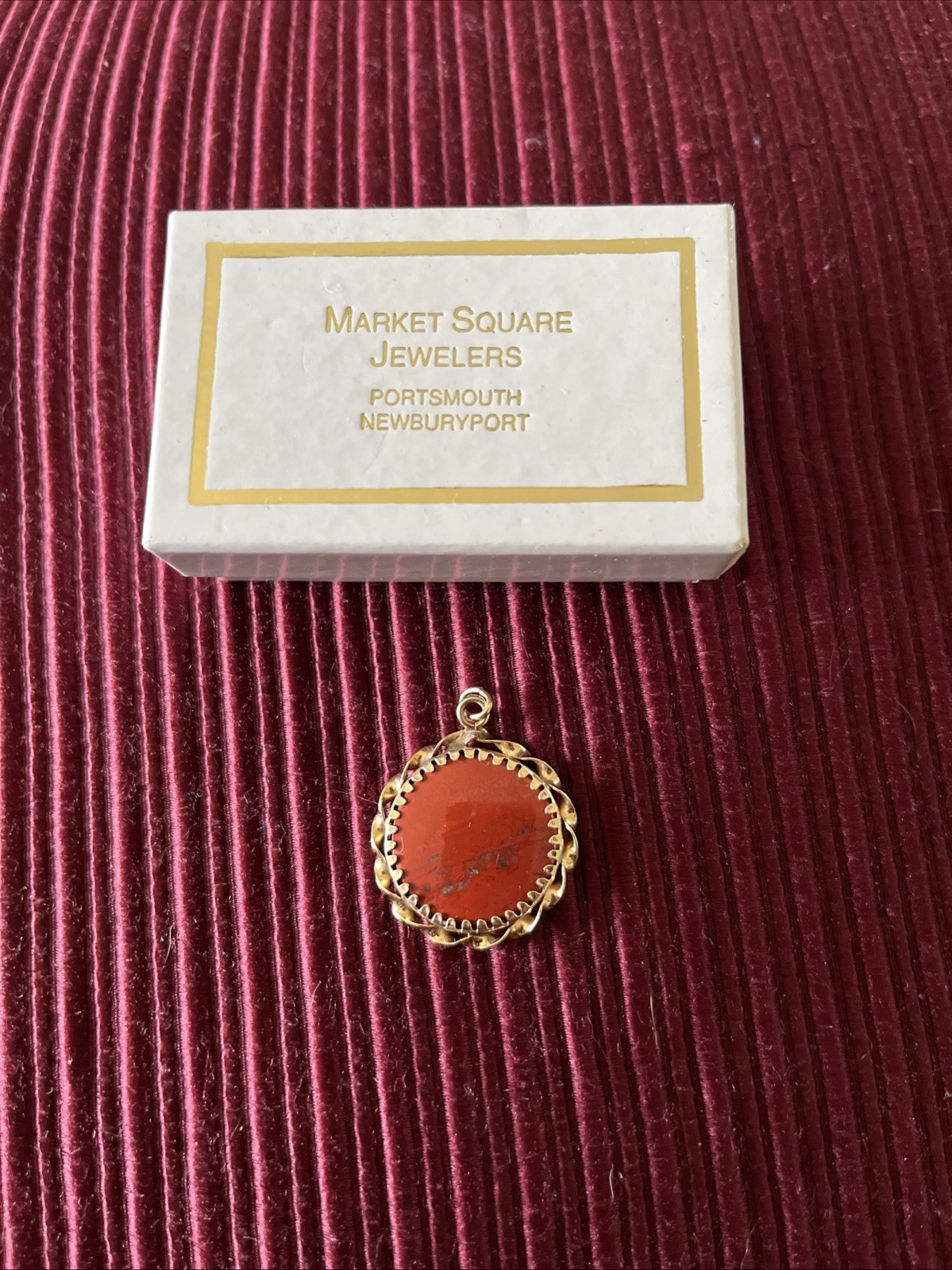 vintage 14k gold pendant featuring a round, rich red vintage coral or red jasper vintage 14k gold pendant featuring a round, rich red vintage coral or red jasper