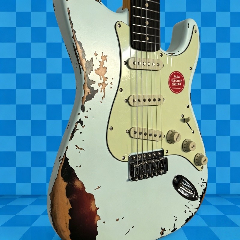 electric guitar aged light green tremolo bridge rosewood fretboard guitar