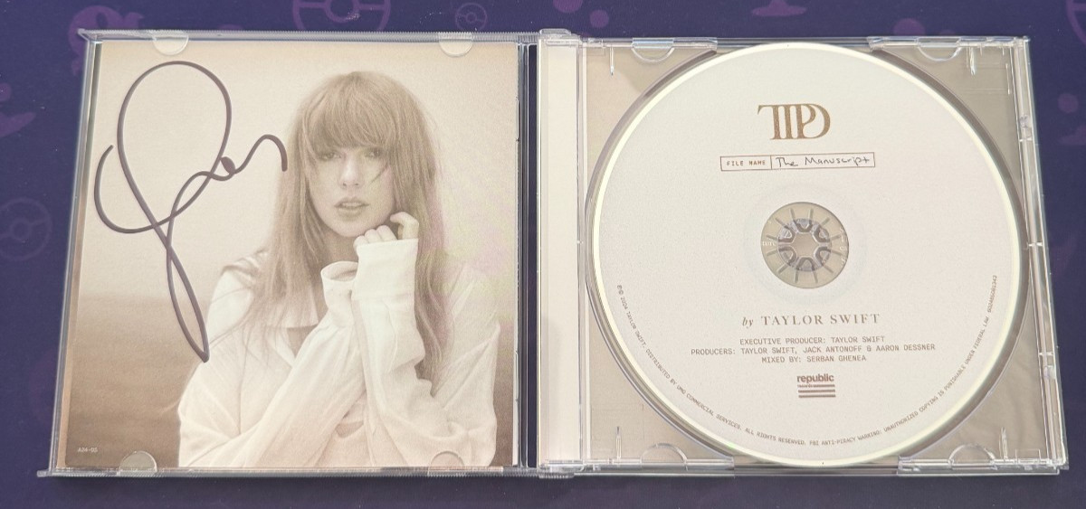Taylor Swift The Tortured Poets Department CD & Hand Signed Photo In Hand Taylor Swift The Tortured Poets Department CD & Hand Signed Photo In Hand