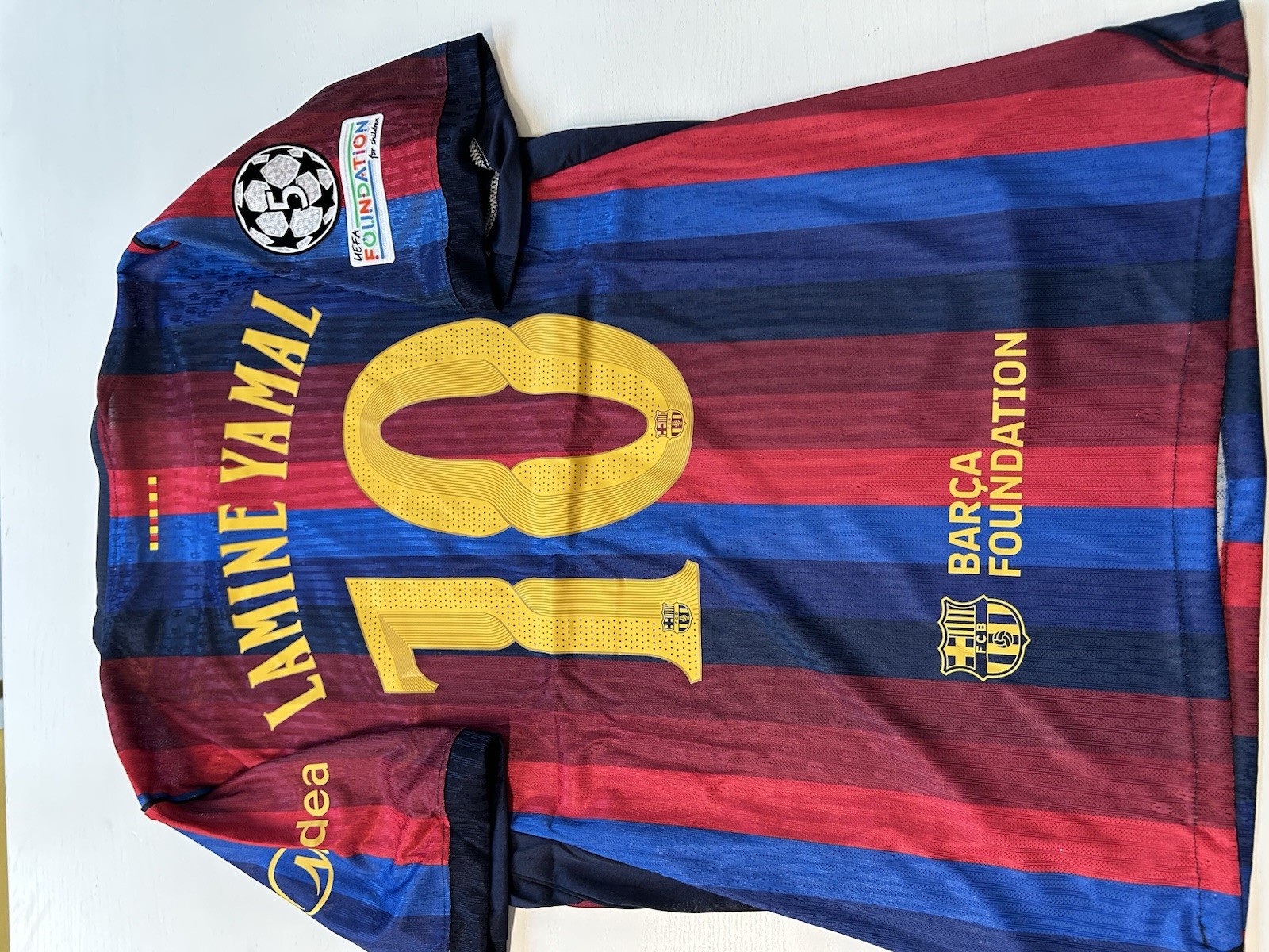 Nike FC Barcelona Red Home Shirt Lamine Yamal 19 Short Sleeve UEFA Foundation Nike FC Barcelona Red Home Shirt Lamine Yamal 19 Short Sleeve UEFA Foundation