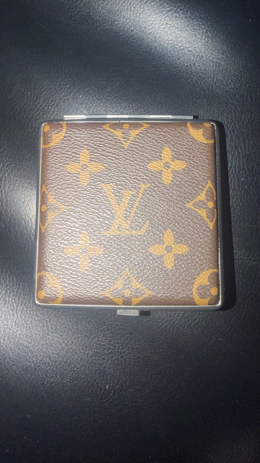 LV 1970 vintage ciggarets box with magnet and hold elastic. good condition