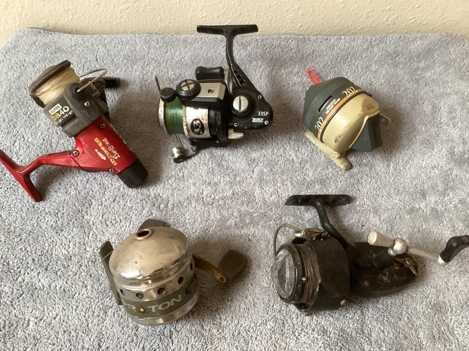 Fishing Reel Lot of (5) Vintage Zebco / Proton / Silstar - Spinner & Thumb Cast