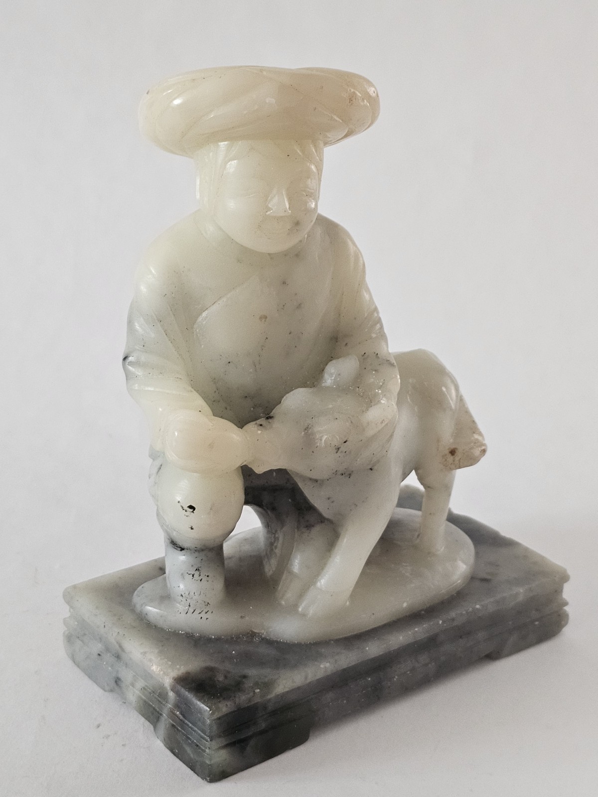 1900s Chinese Soapstone  Miao Man In Traditional Attire Feeding A Buffalo Calf
