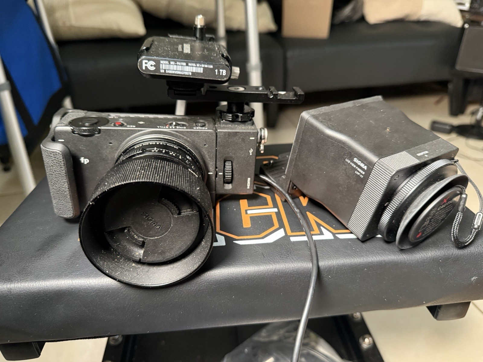 Sigma fp Bundle w/ 45mm f/2.8, LVF-11 viewfinder, 1TB SSD + Extras - $1125