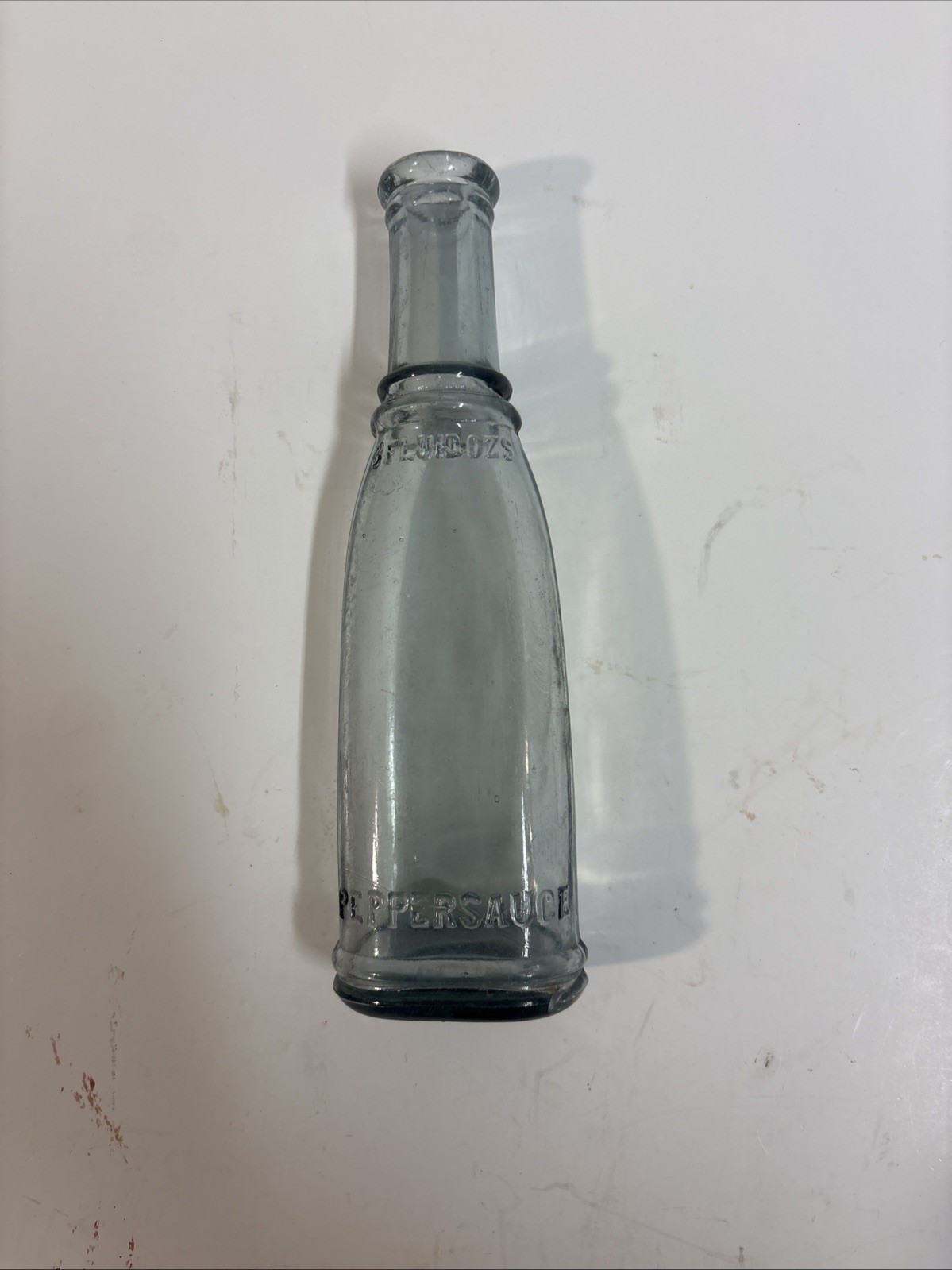 Beautiful Vintage Early 1900s Aqua Embossed Pepper Sauce Bottle. Great... Beautiful Vintage Early 1900s Aqua Embossed Pepper Sauce Bottle. Great...