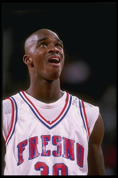 Willie Farley Fresno State Bulldogs stands on the court the Arkans- Old Photo