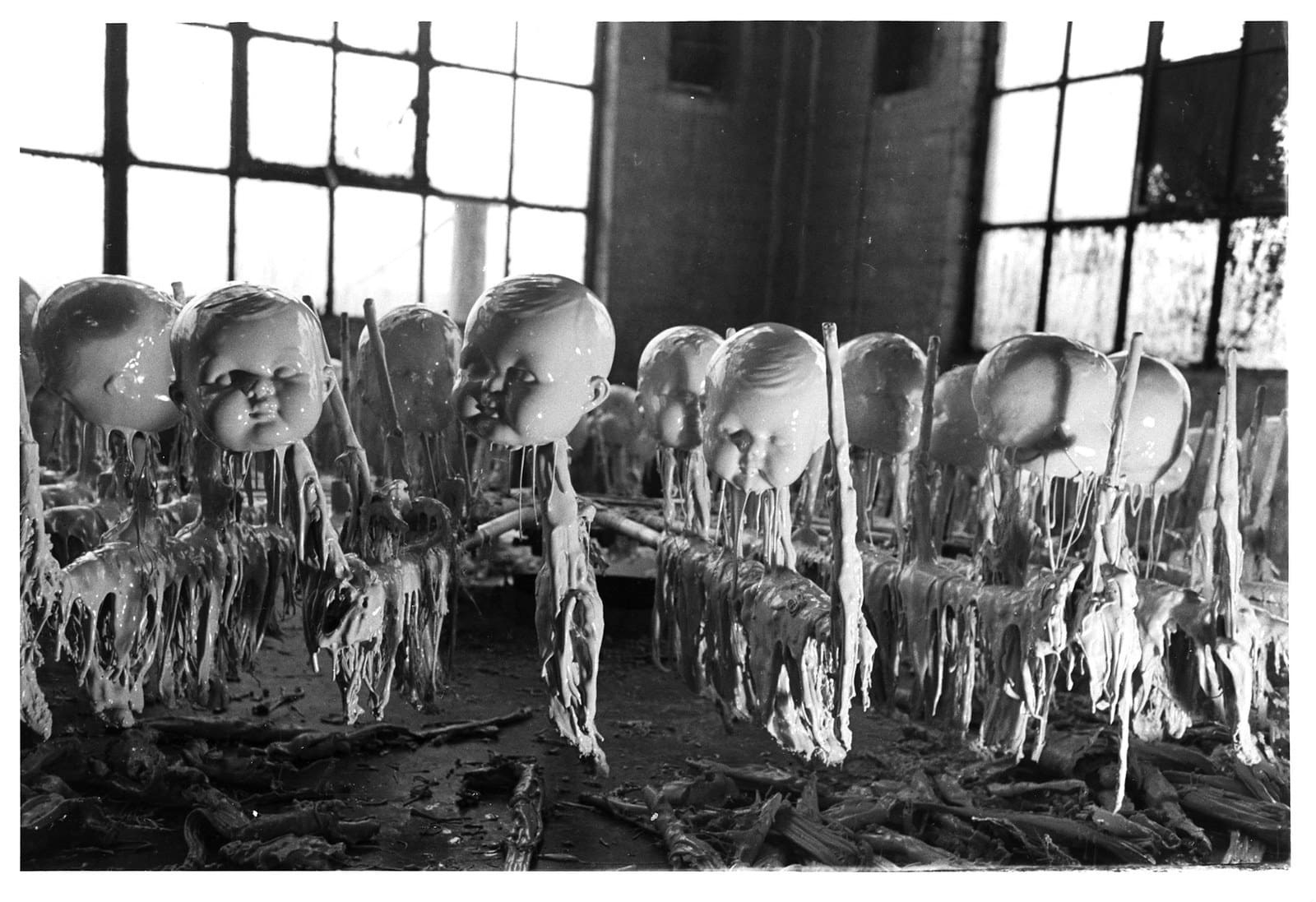 Creepy dripping doll heads of a toy factory, circa 1900 8.5x11 Photo Reprint