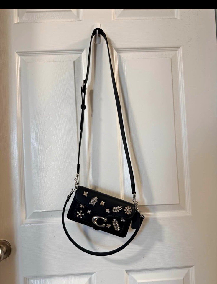 Coach “The Tabby Bag” black crossbody bag with adjustable and removable strap.