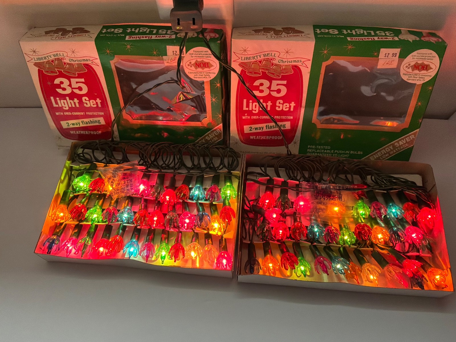 2 MCM Liberty Bell Christmas 35 Lite MultiColor Flashing Indoor Outdoor NOS 1982 2 MCM Liberty Bell Christmas 35 Lite MultiColor Flashing Indoor Outdoor NOS 1982