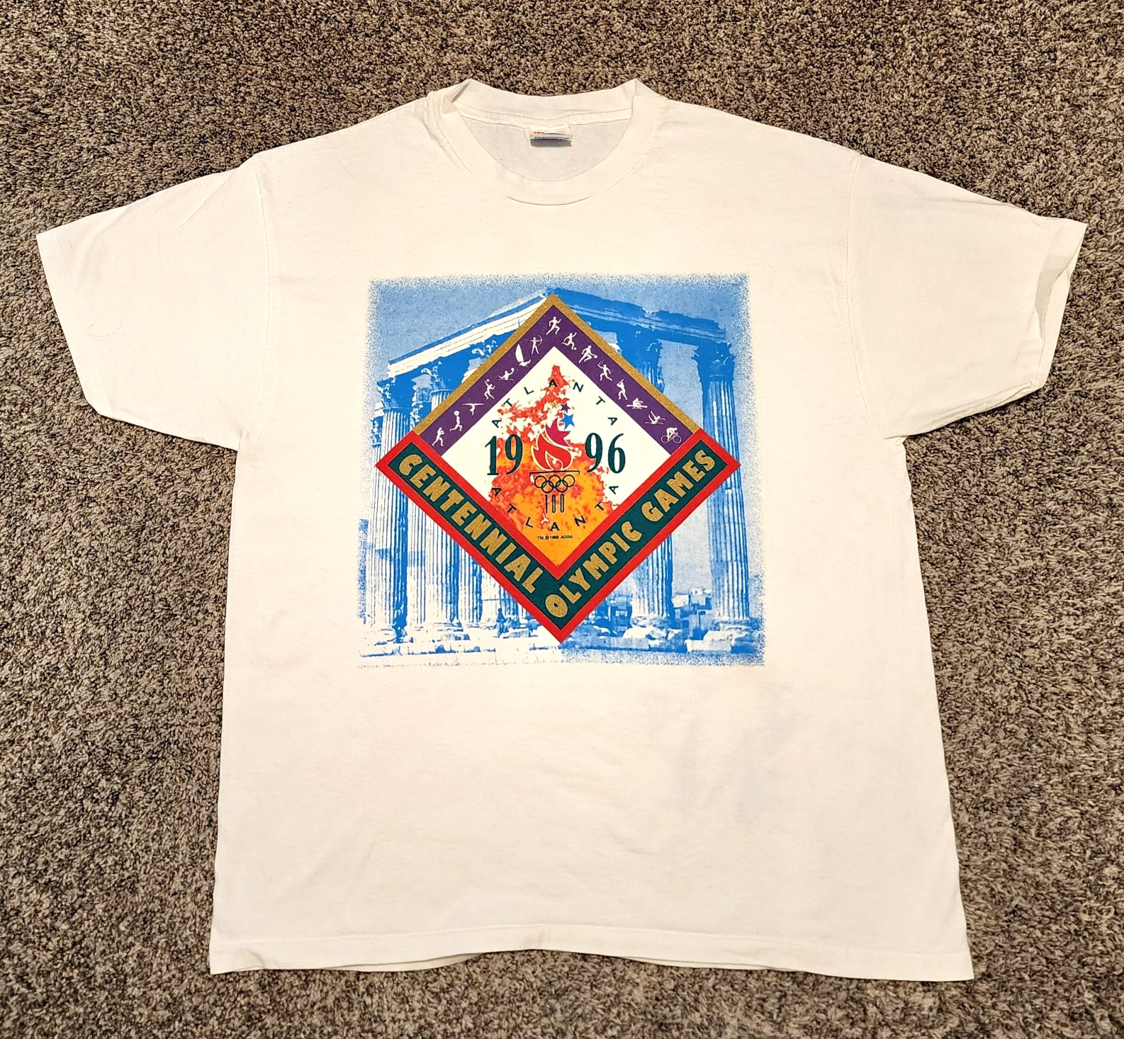 Hanes Atlanta 1996 Centennial Olympic Games Graphic T-Shirt Unisex XL White Hanes Atlanta 1996 Centennial Olympic Games Graphic T-Shirt Unisex XL White