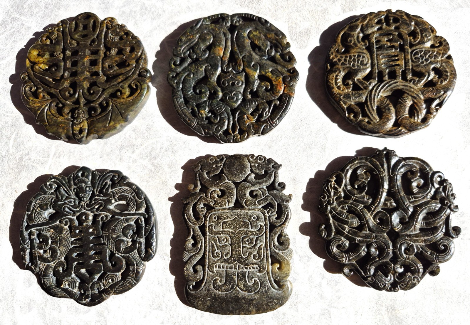 Collection of Six Fengshui Chinese Carved Jade Yubi Bi Amulet Pendants