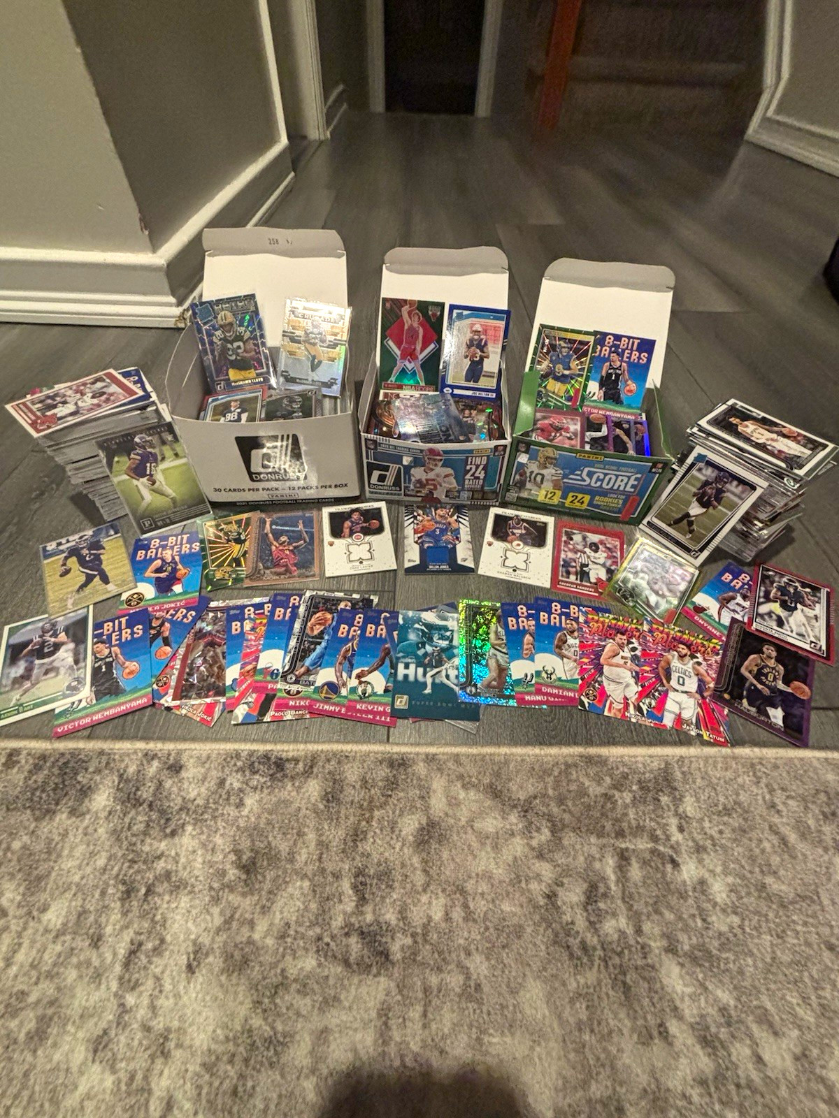 Selling my collection 50 card lot football\ basketball numbered cards rookies,et