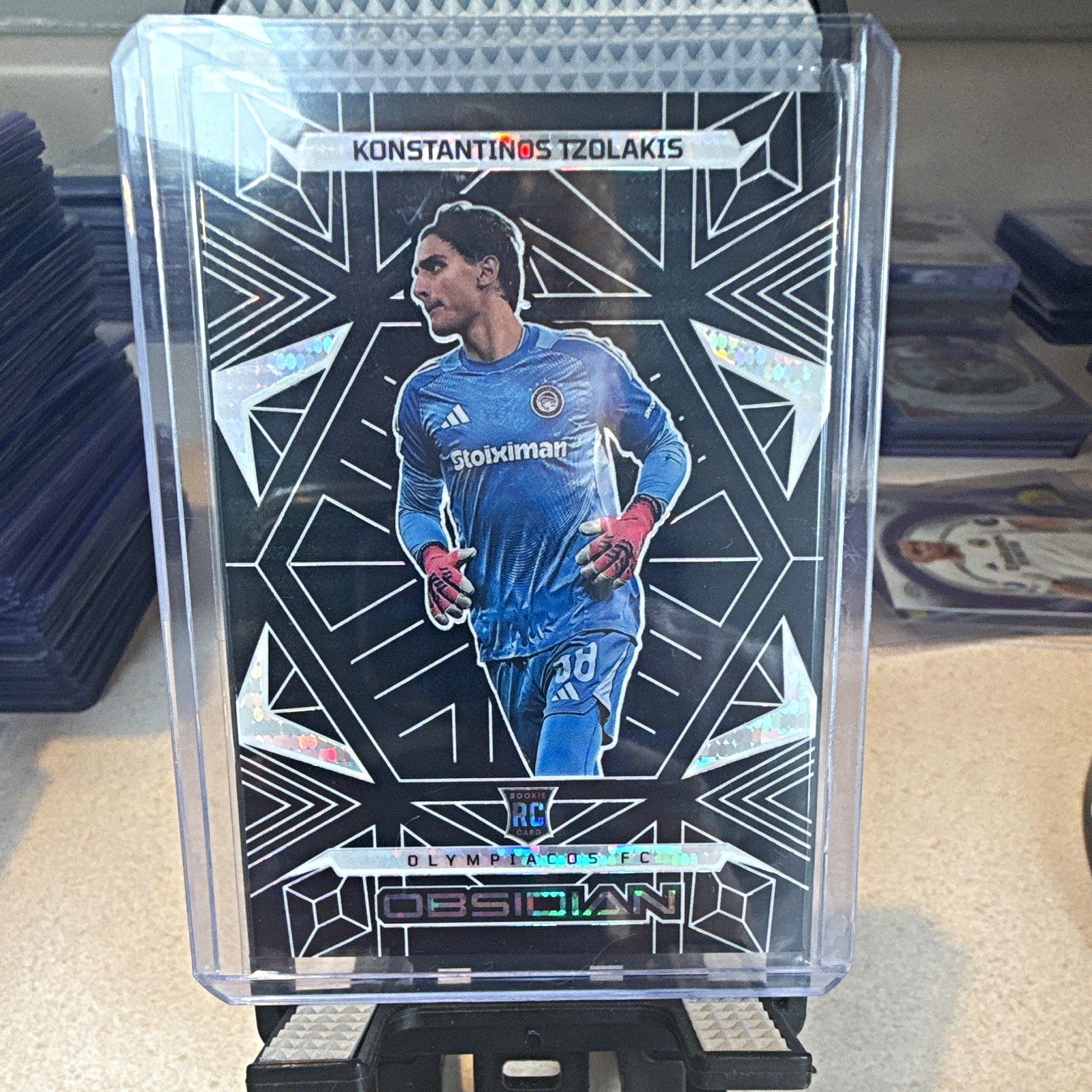 2025-26 Panini Obsidian Soccer - Konstantinos Tzolakis RC 05/11 #133 Olympiacos 2025-26 Panini Obsidian Soccer - Konstantinos Tzolakis RC 05/11 #133 Olympiacos