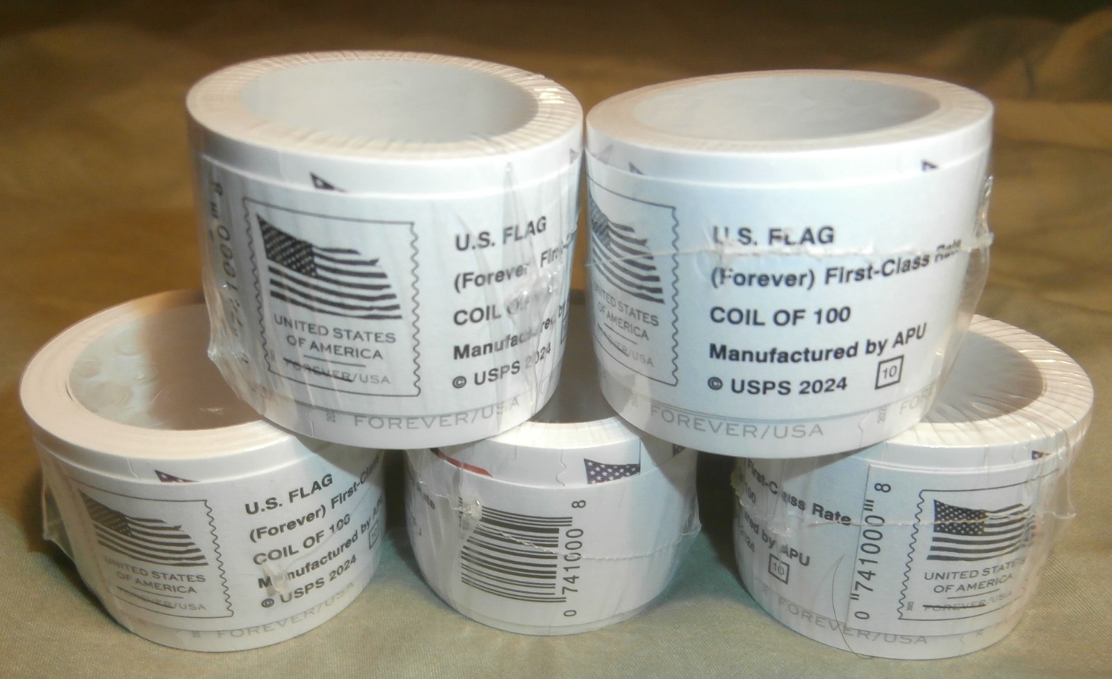 5 rolls of 100 USPS stamps totaling 500 pcs. 5 rolls of 100 USPS stamps totaling 500 pcs.