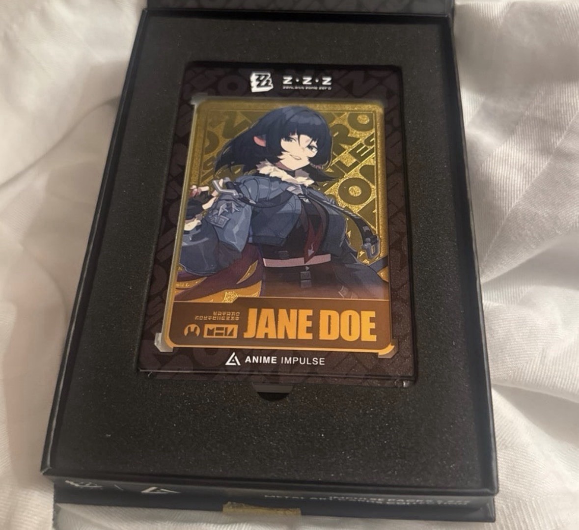 ZZZ x Anime Impulse Jane Doe Gold Metal Card Limited Edition ZZZ x Anime Impulse Jane Doe Gold Metal Card Limited Edition