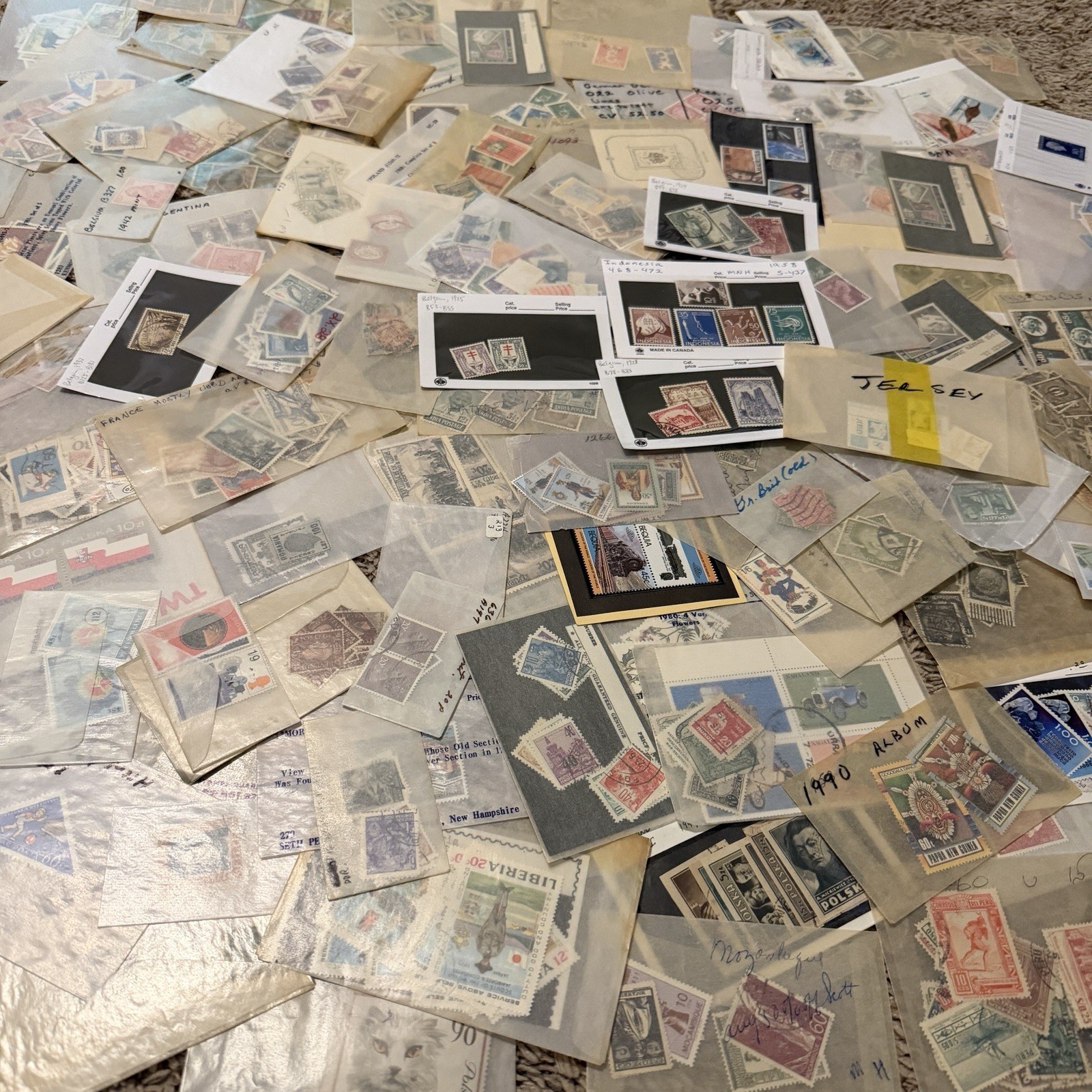 MASSIVE LOT OF WORLDWIDE STAMPS IN GLASSINES MINT, USED, OVERPRINTS AND MORE MASSIVE LOT OF WORLDWIDE STAMPS IN GLASSINES MINT, USED, OVERPRINTS AND MORE