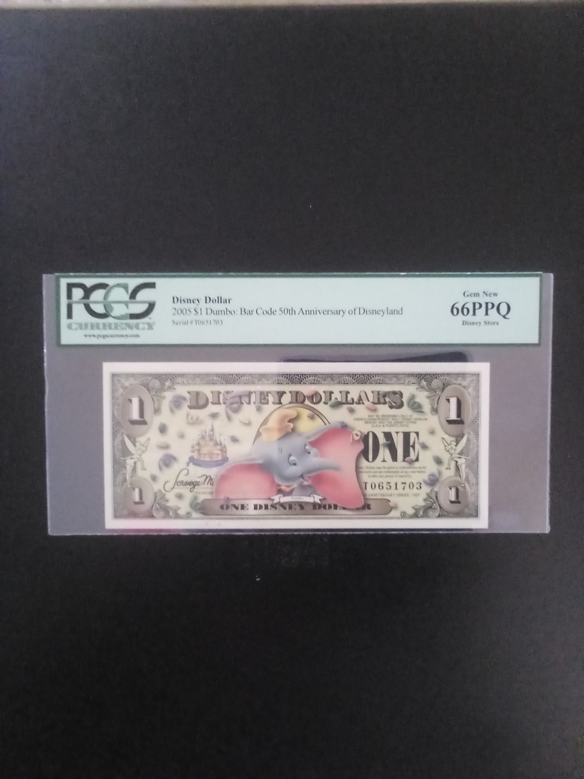 Disney Dollars 2005 T Dumbo (with a bar code) PCGS 66 Gem New Disney Dollars 2005 T Dumbo (with a bar code) PCGS 66 Gem New