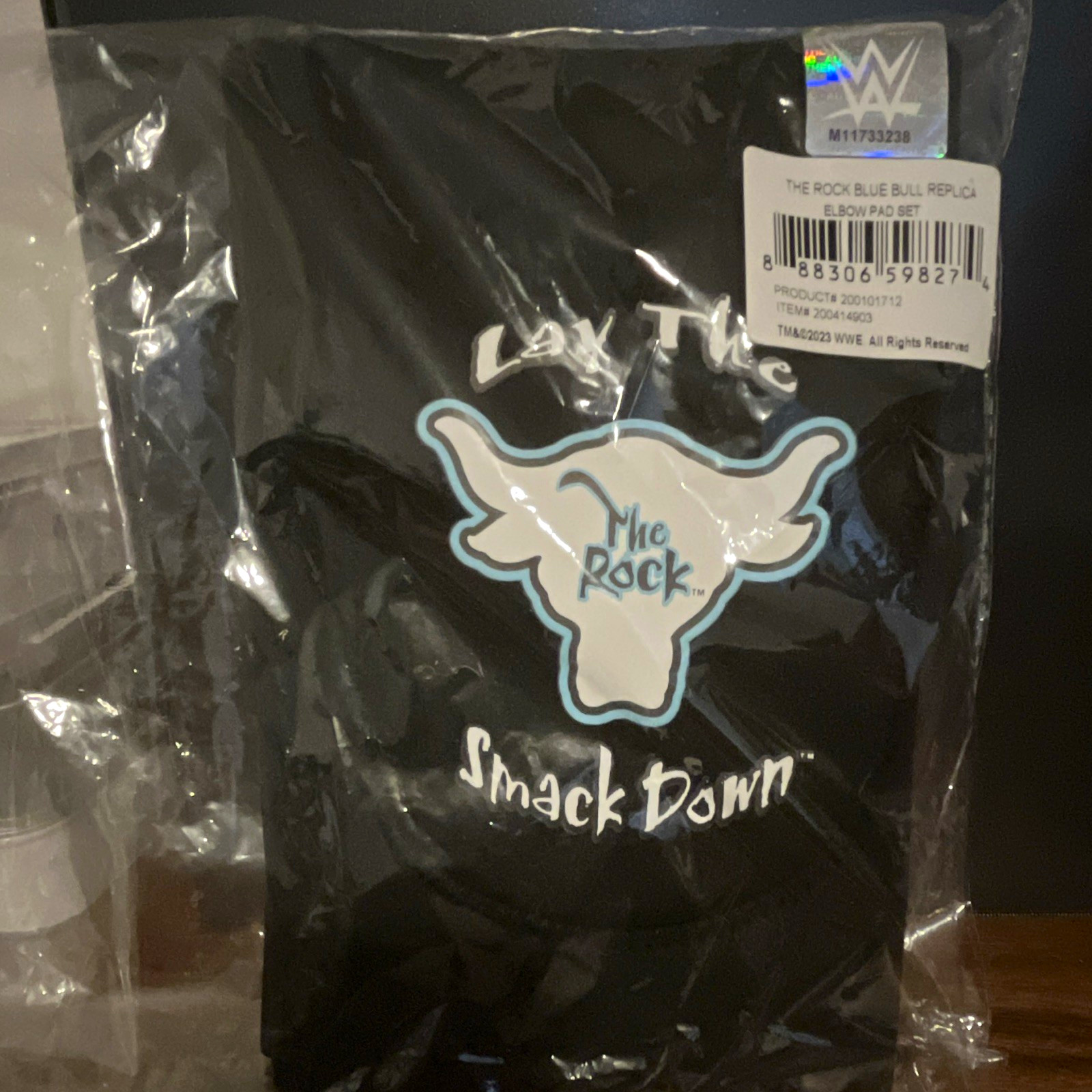 WWE The Rock Replica Elbow Pad Set Blue Black White SmackDown sealed WWE The Rock Replica Elbow Pad Set Blue Black White SmackDown sealed