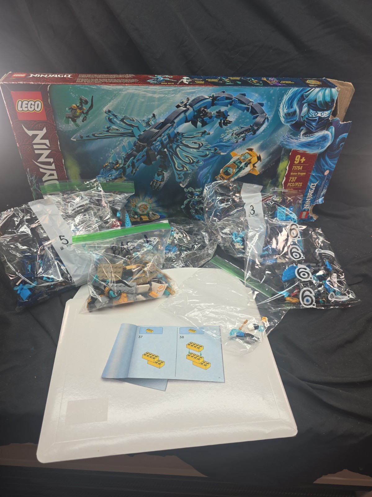 LEGO Ninjago 71754 Water Dragon Seabound Set w/ Minifigures 99% Complete LEGO Ninjago 71754 Water Dragon Seabound Set w/ Minifigures 99% Complete