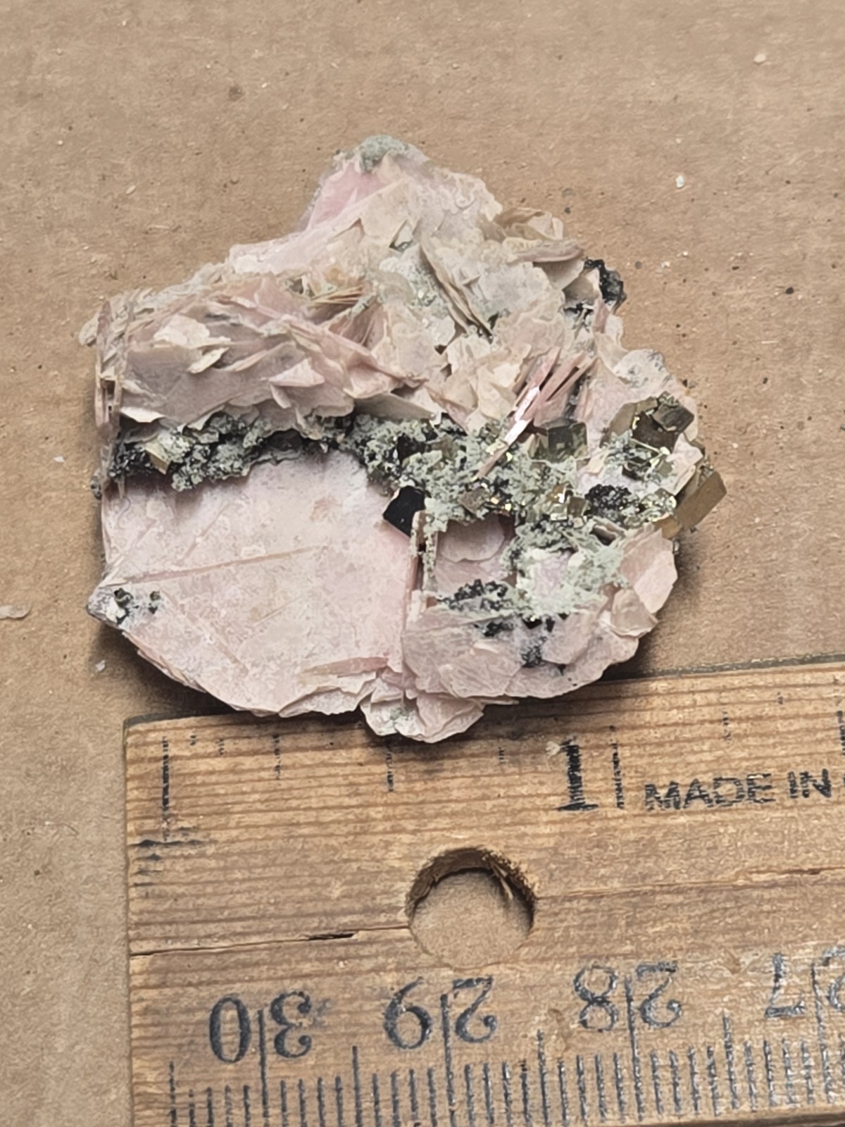 Beautiful Pyrite On  Rhodochrosite specimen