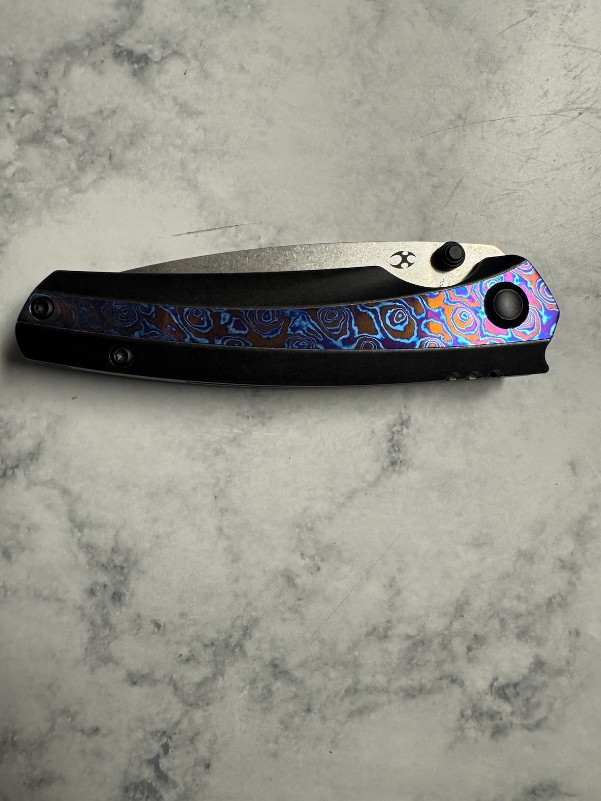Kansept Raven Folding Knife 20CV Blackwash Titanium Timascus Kansept Raven Folding Knife 20CV Blackwash Titanium Timascus